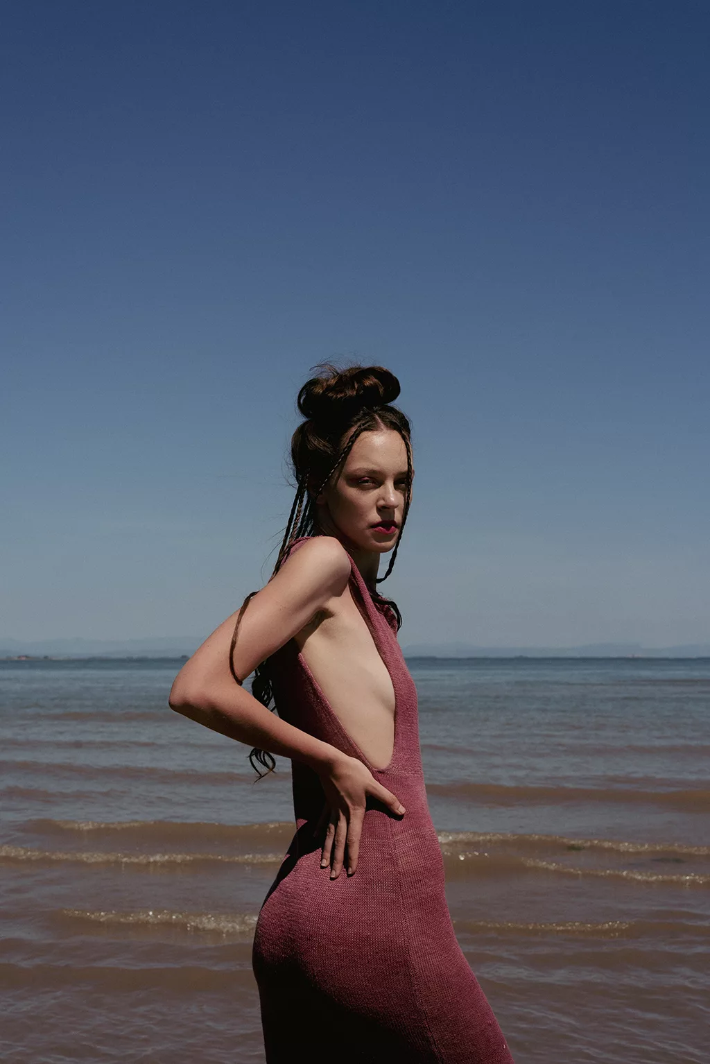 Lilith dress, bold and seductive, made from pure hemp and dyed with natural aronia pigment. Customizable in color and material, crafted with a timeless, zero waste design.